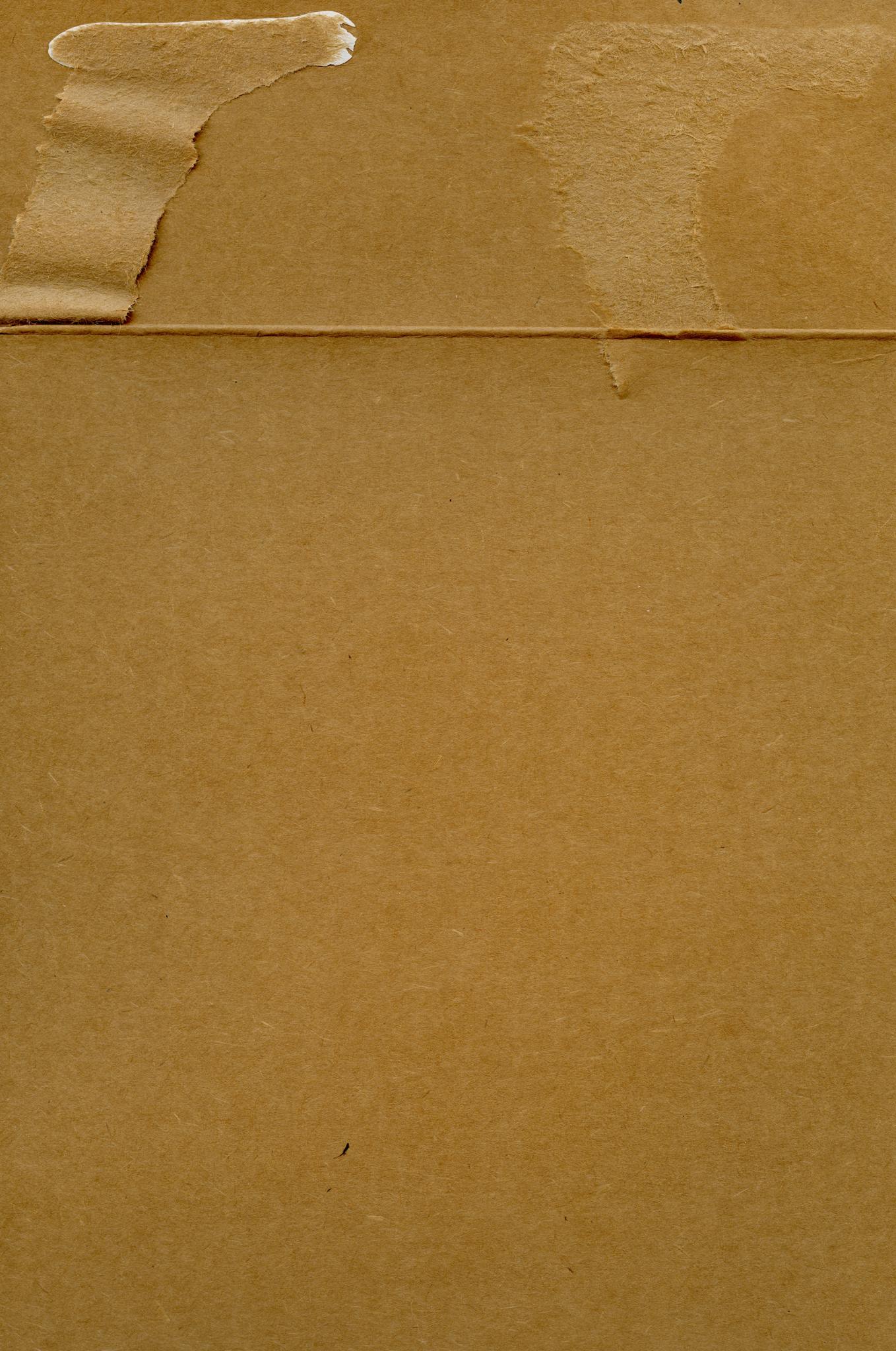 A close-up shot of a textured brown cardboard surface, ideal for backgrounds.
